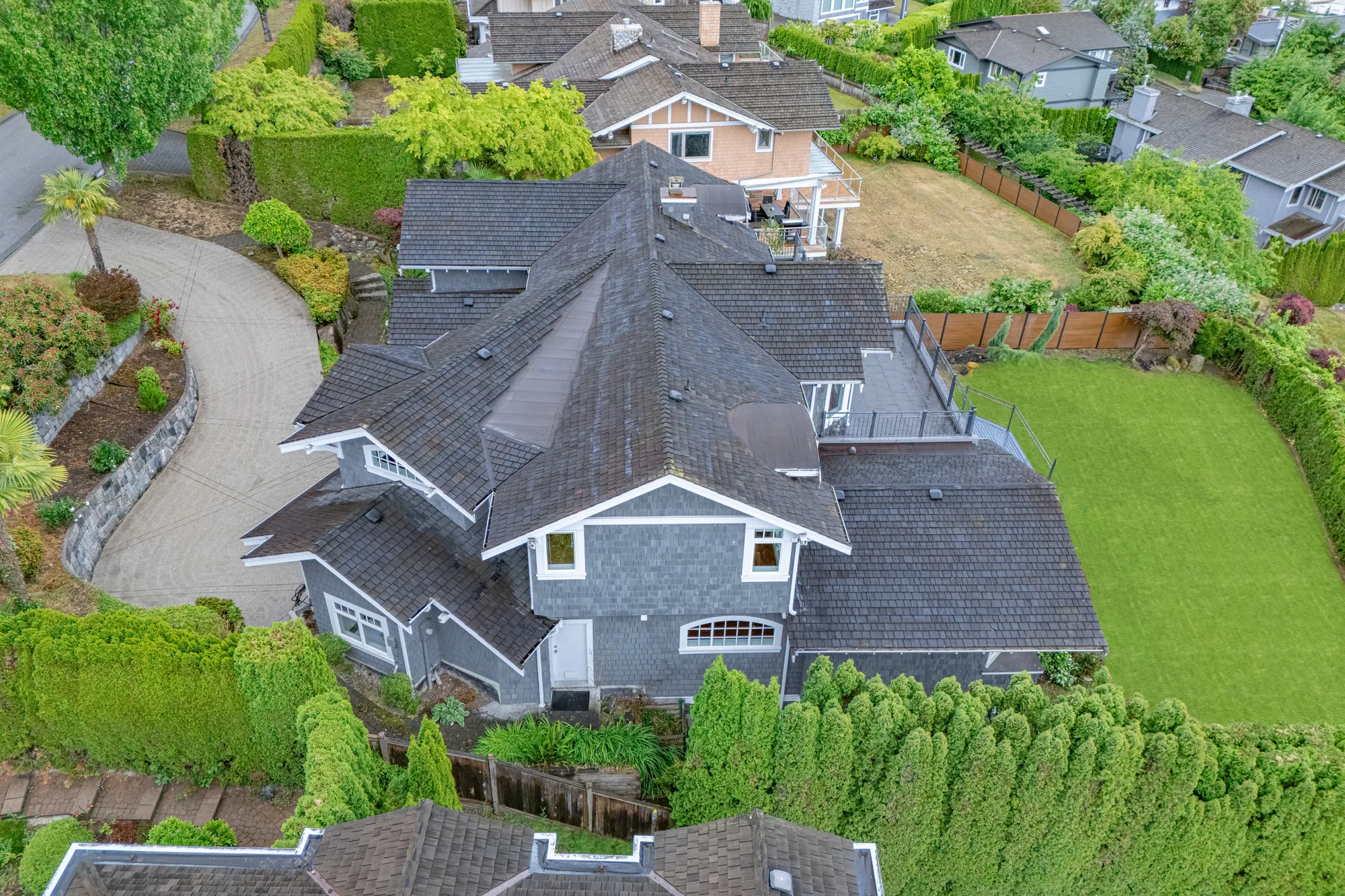 Looking down on the roof and the drive from directly above the front of the house